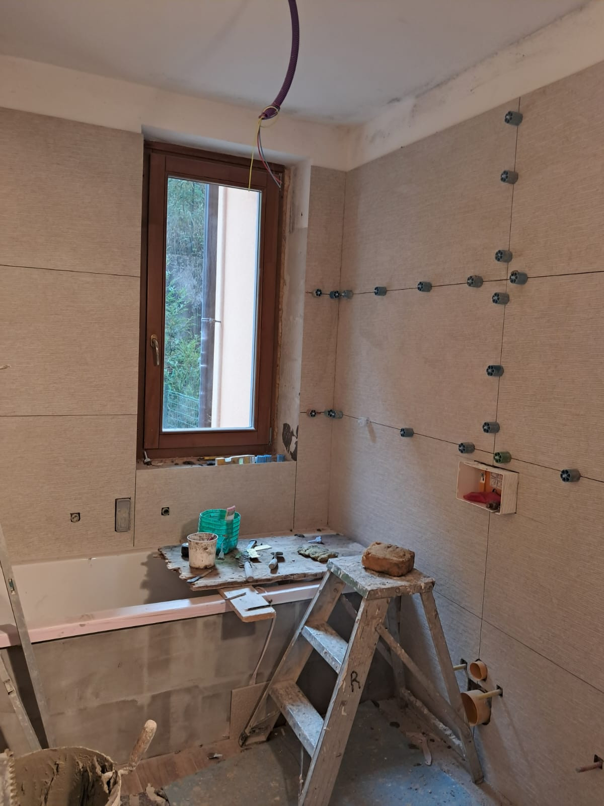 posa rivestimento bagno   in gres porcellanato  doghe 60 *120