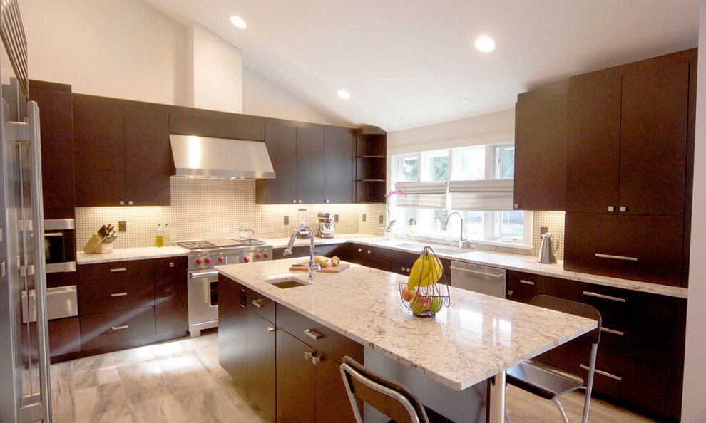 This is an example of a mid-sized modern u-shaped eat-in kitchen in Boston with an undermount sink, flat-panel cabinets, dark wood cabinets, granite benchtops, brown splashback, glass tile splashback, stainless steel appliances, porcelain floors and with island.