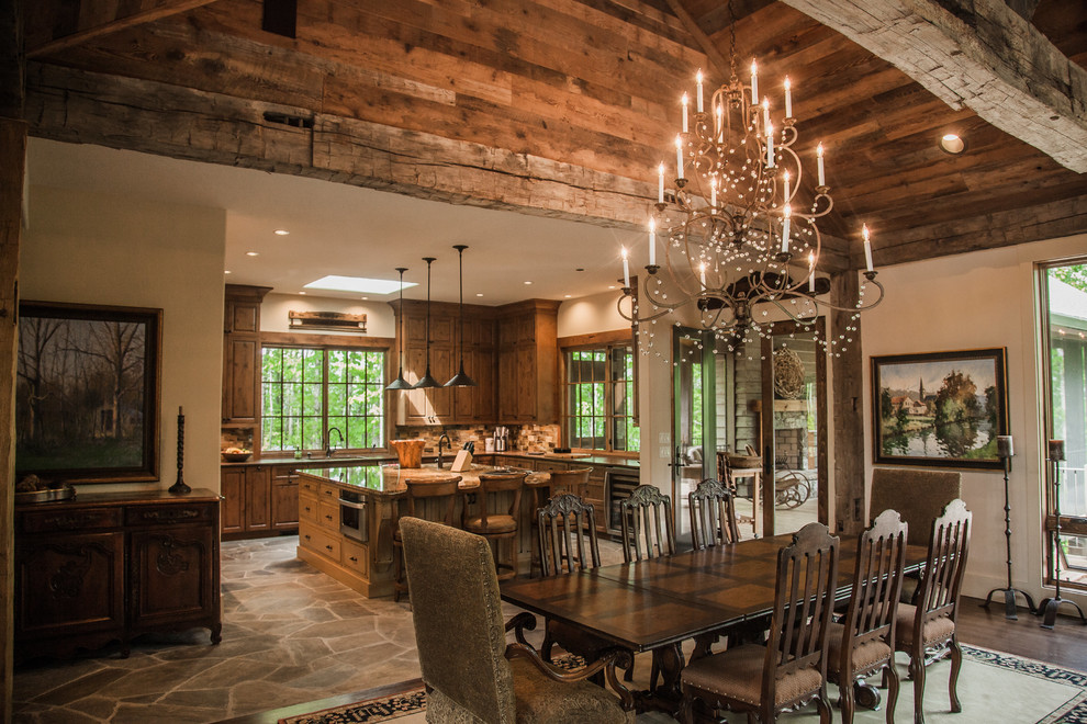 Photo of a country open plan dining in Other with beige walls and dark hardwood floors.