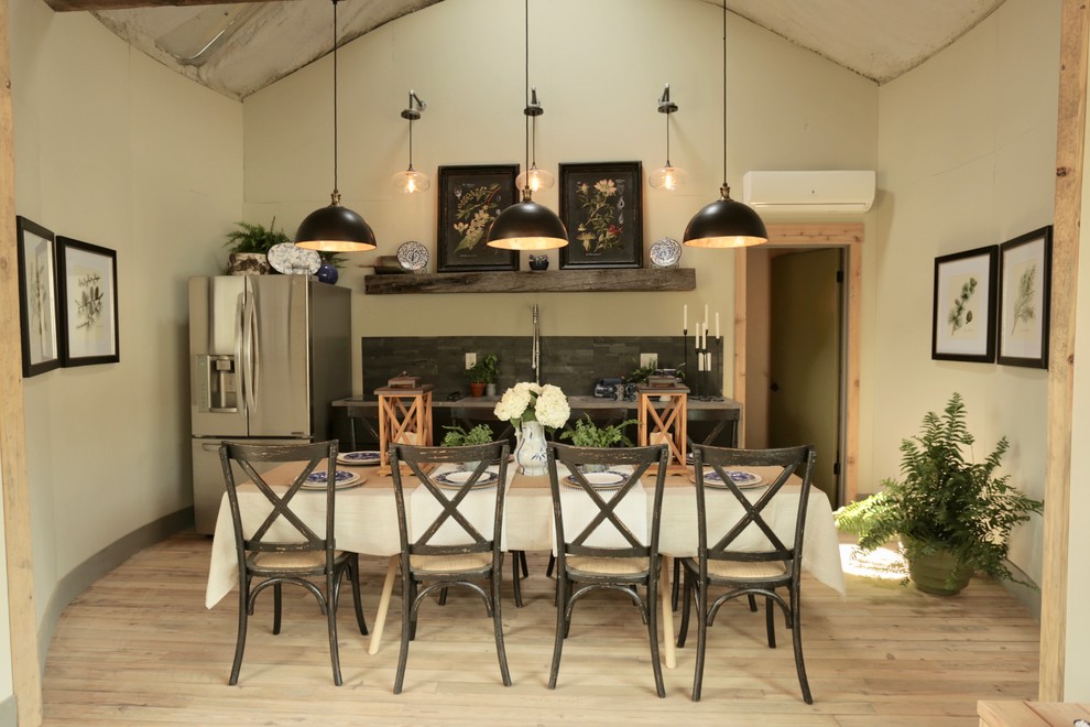 Great room - small transitional single-wall light wood floor great room idea with an undermount sink, flat-panel cabinets, black cabinets, granite countertops, multicolored backsplash, stainless steel appliances, no island and gray countertops