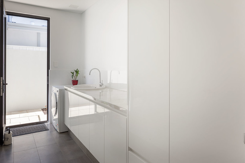 This is an example of a contemporary laundry room in Perth.