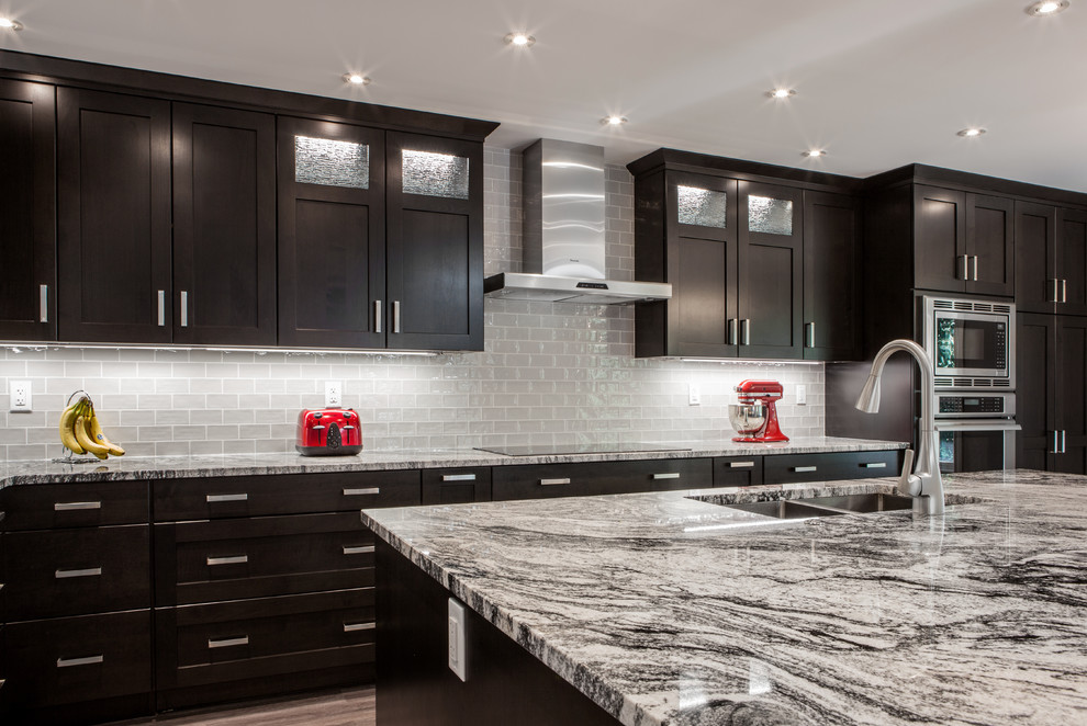 This is an example of a contemporary kitchen in Calgary.