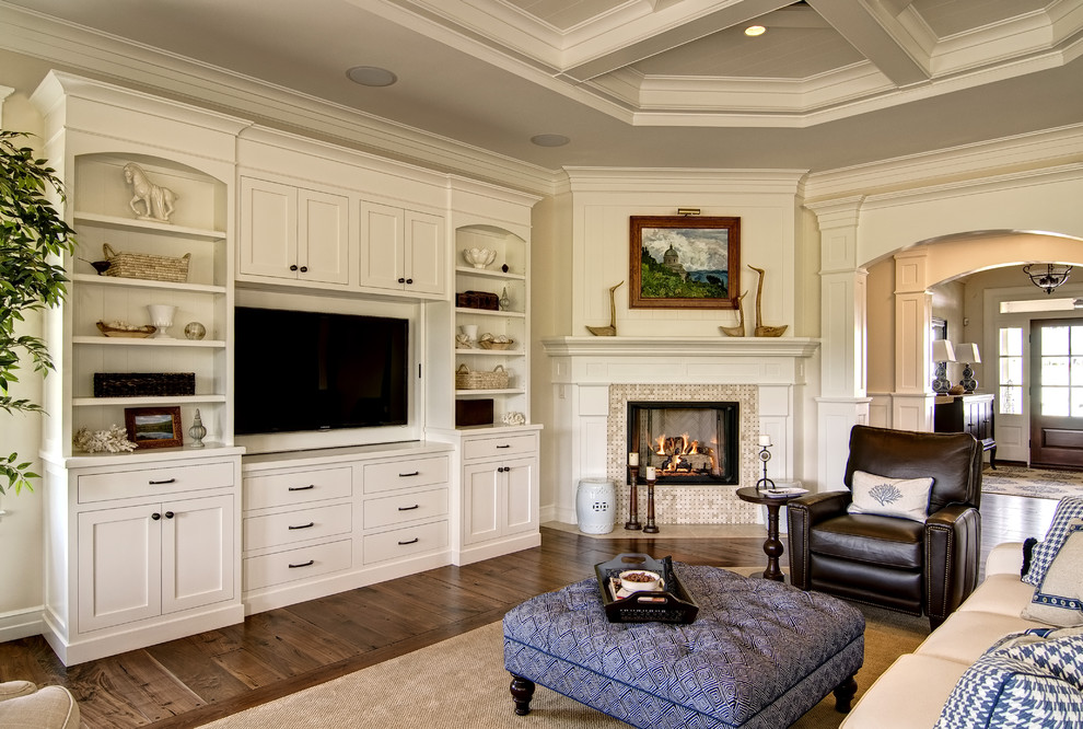 Inspiration for a traditional family room in Other with a corner fireplace and a tile fireplace surround.