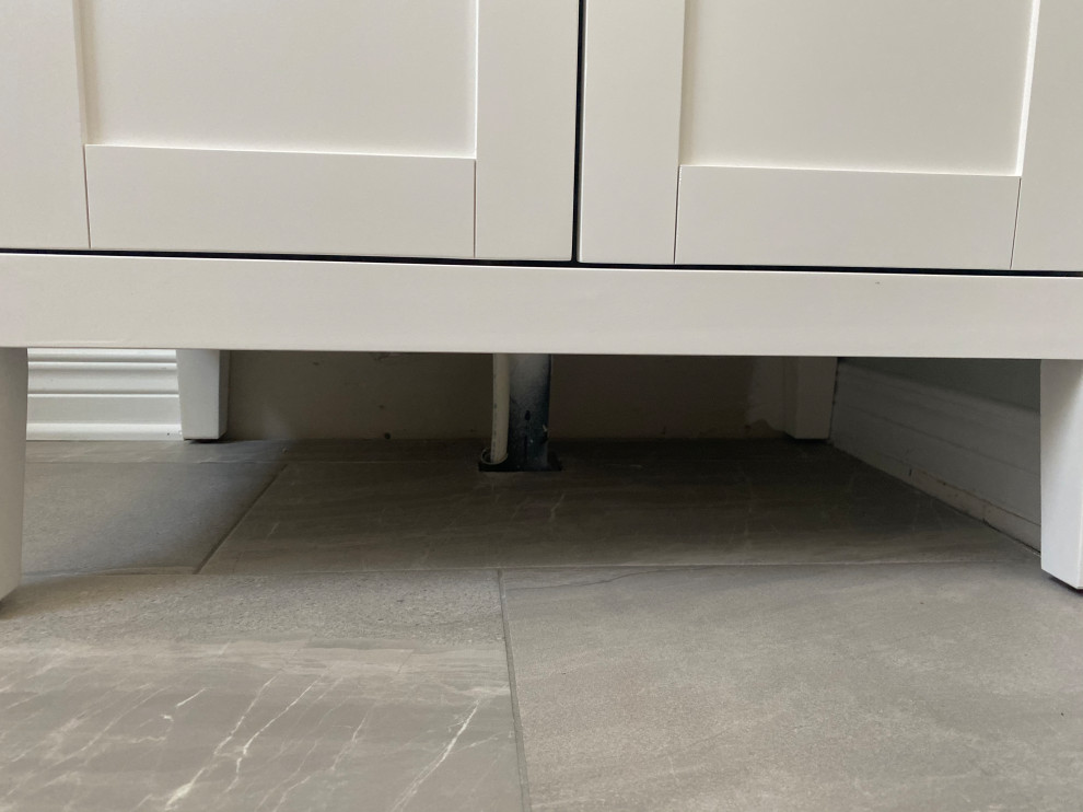 How to hide pipes under bathroom vanity
