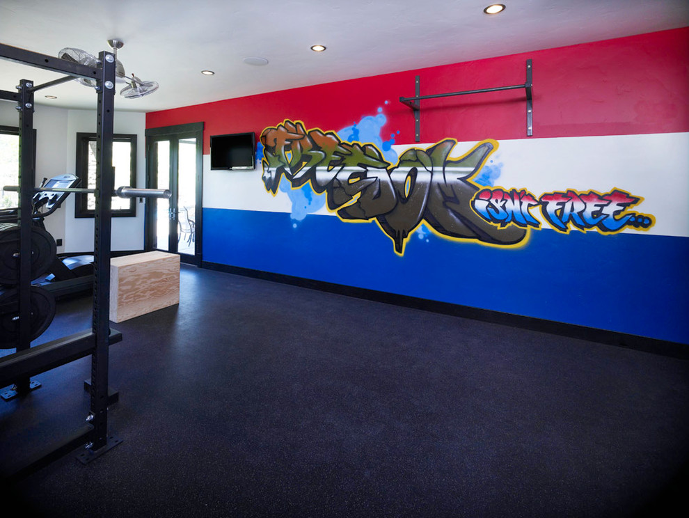 This is an example of a large eclectic multipurpose gym in Salt Lake City with multi-coloured walls and cork floors.