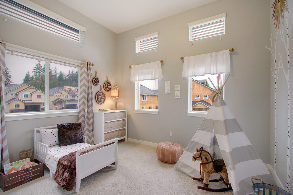 Design ideas for a mid-sized transitional kids' room in Seattle with grey walls and carpet.
