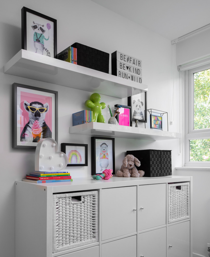 Design ideas for a small modern gender-neutral kids' bedroom for kids 4-10 years old in London with grey walls and grey floor.