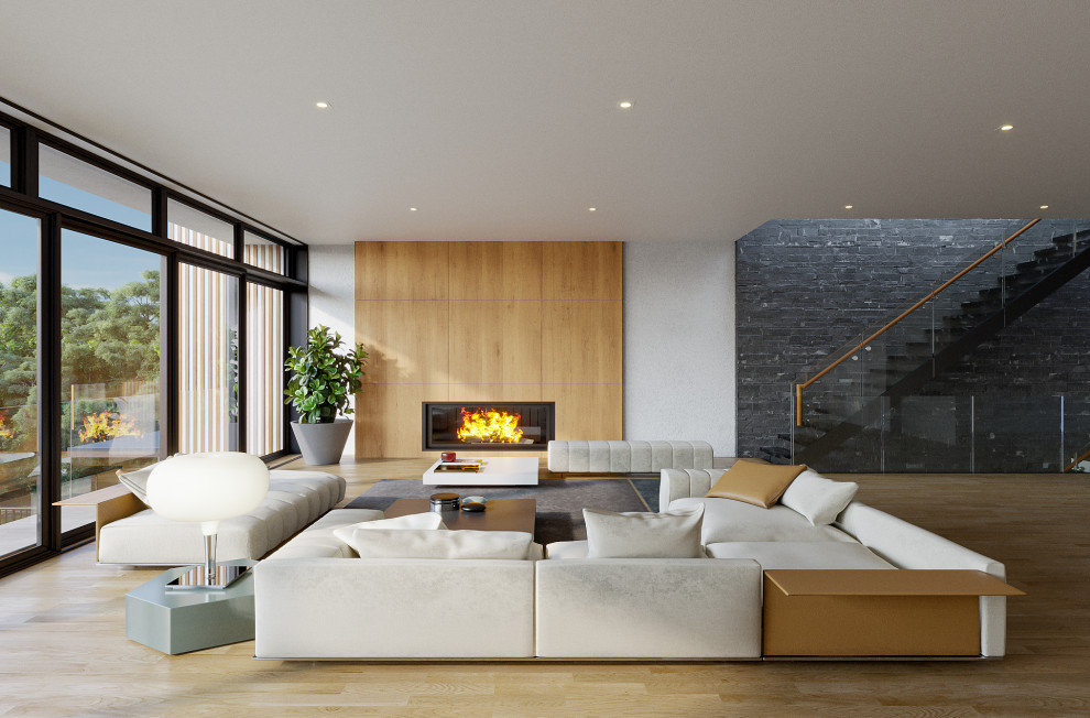 Идея дизайна: большая открытая гостиная комната в стиле модернизм с белыми стенами, светлым паркетным полом, стандартным камином, скрытым телевизором, бежевым полом и деревянными стенами