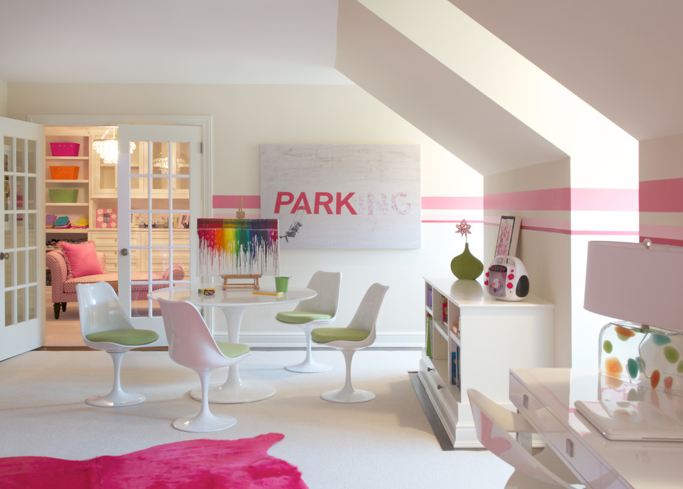 This is an example of a large contemporary kids' room for girls in New York with carpet and multi-coloured walls.