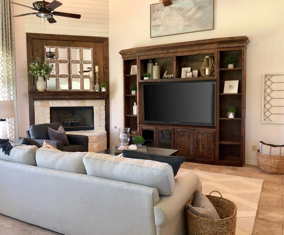 Design ideas for a large country open concept family room in Dallas with beige walls, travertine floors, a corner fireplace, a built-in media wall and beige floor.