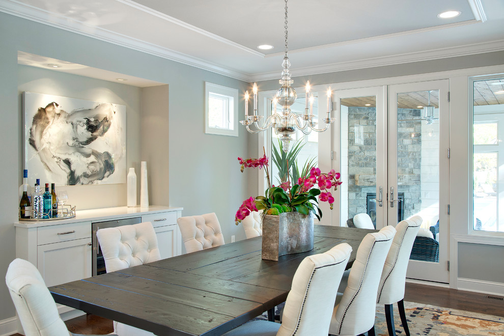 This is an example of a transitional dining room in Minneapolis.