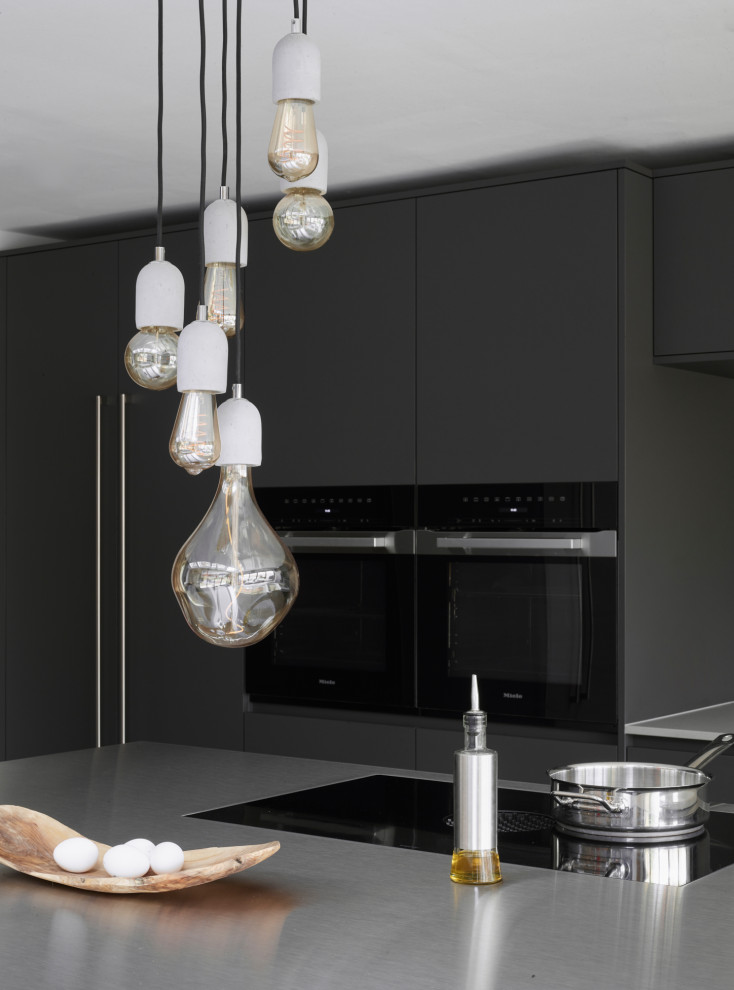 This is an example of a contemporary kitchen in London.