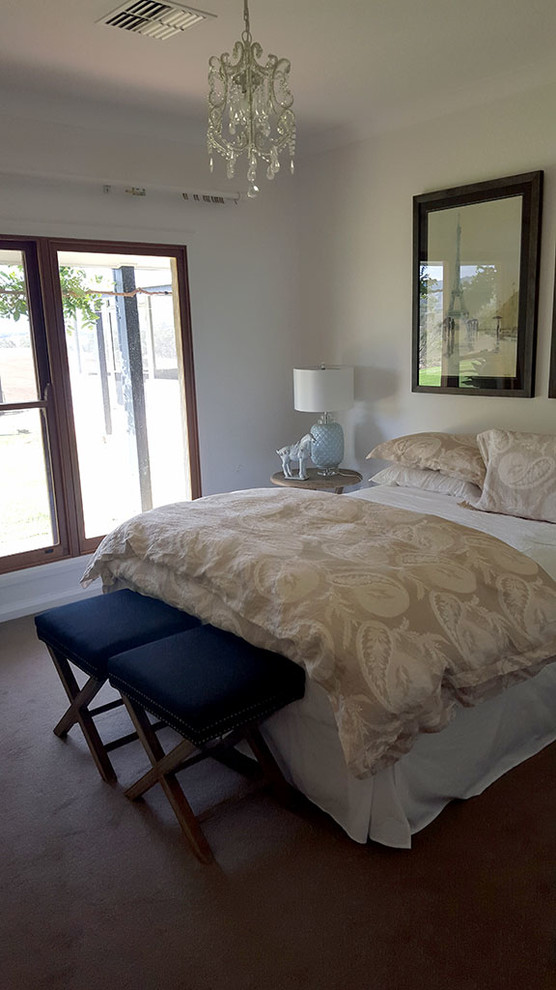 This is an example of a country bedroom in Melbourne.