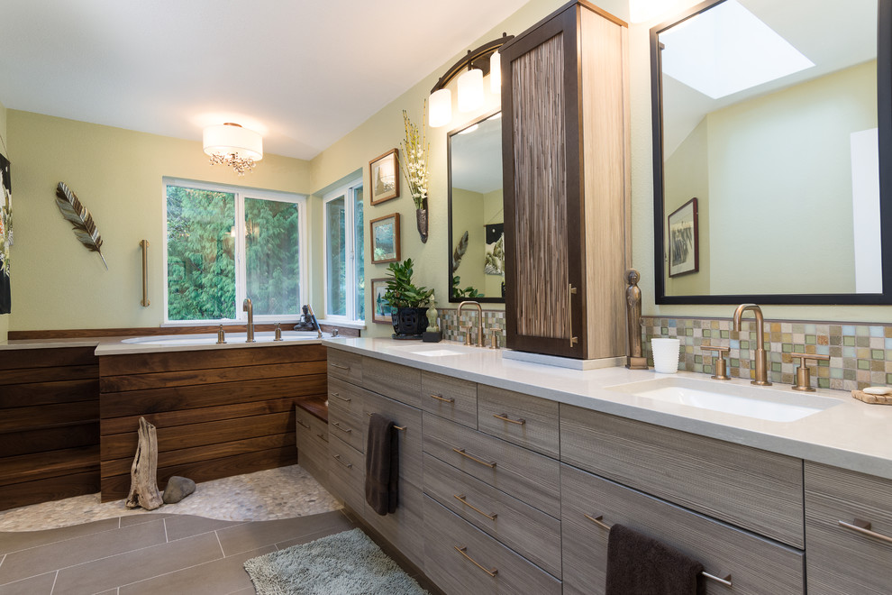 Large asian master bathroom in Other with flat-panel cabinets, grey cabinets, a japanese tub, green tile, mosaic tile, green walls, porcelain floors, an undermount sink, engineered quartz benchtops, grey floor, white benchtops, an alcove shower and a sliding shower screen.