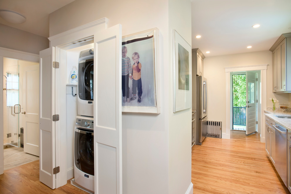 Photo of a transitional laundry room in Boston.