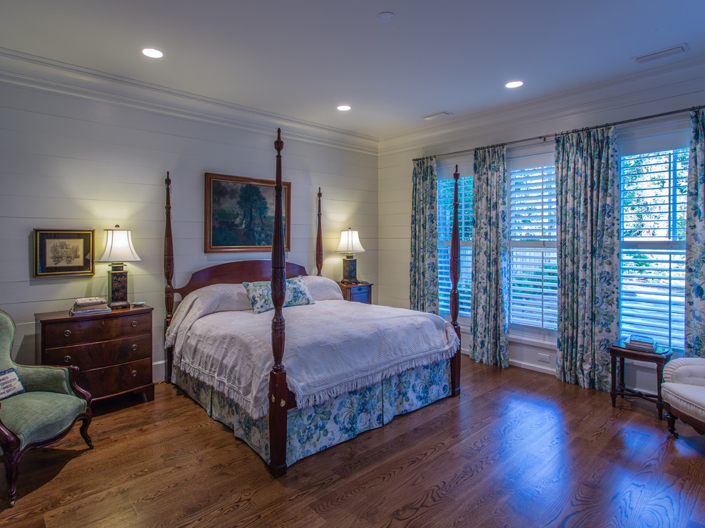 Traditional bedroom in Other with medium hardwood floors.