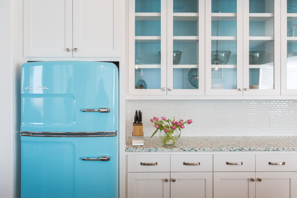 This is an example of a beach style kitchen in Houston.