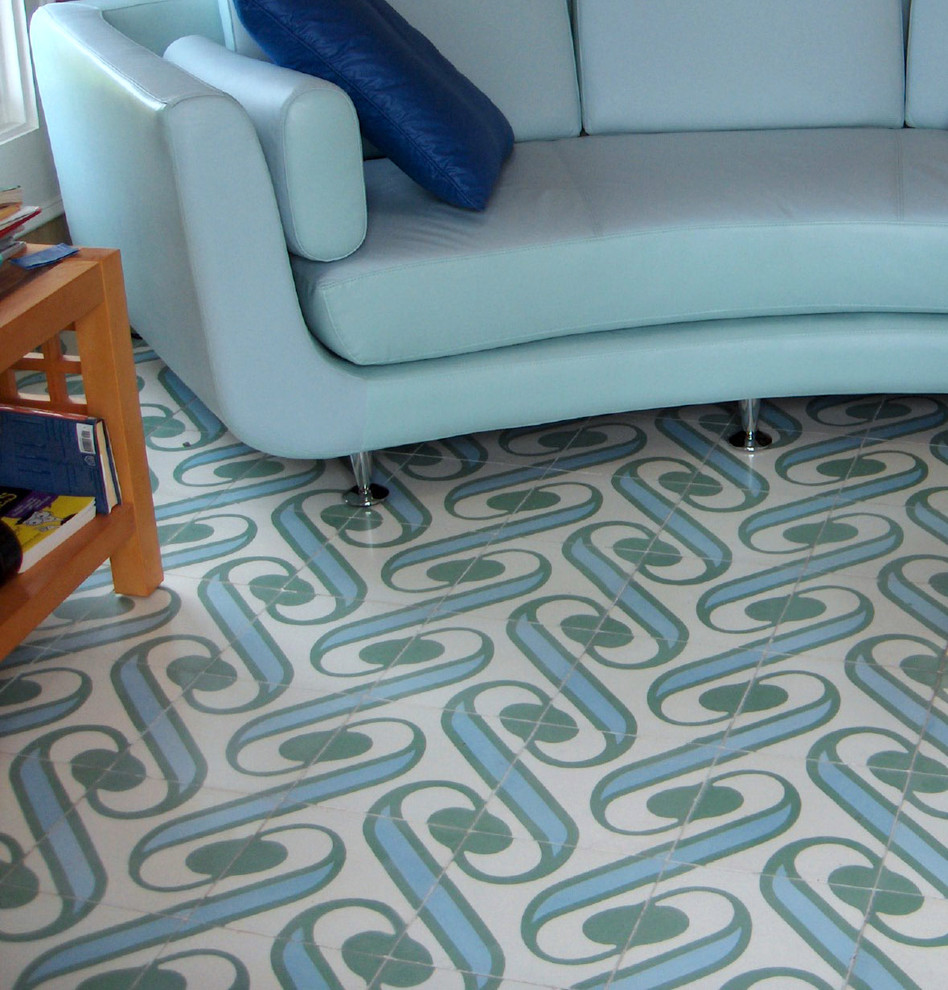 This is an example of a mid-sized beach style open concept living room in Miami with multi-coloured floor.