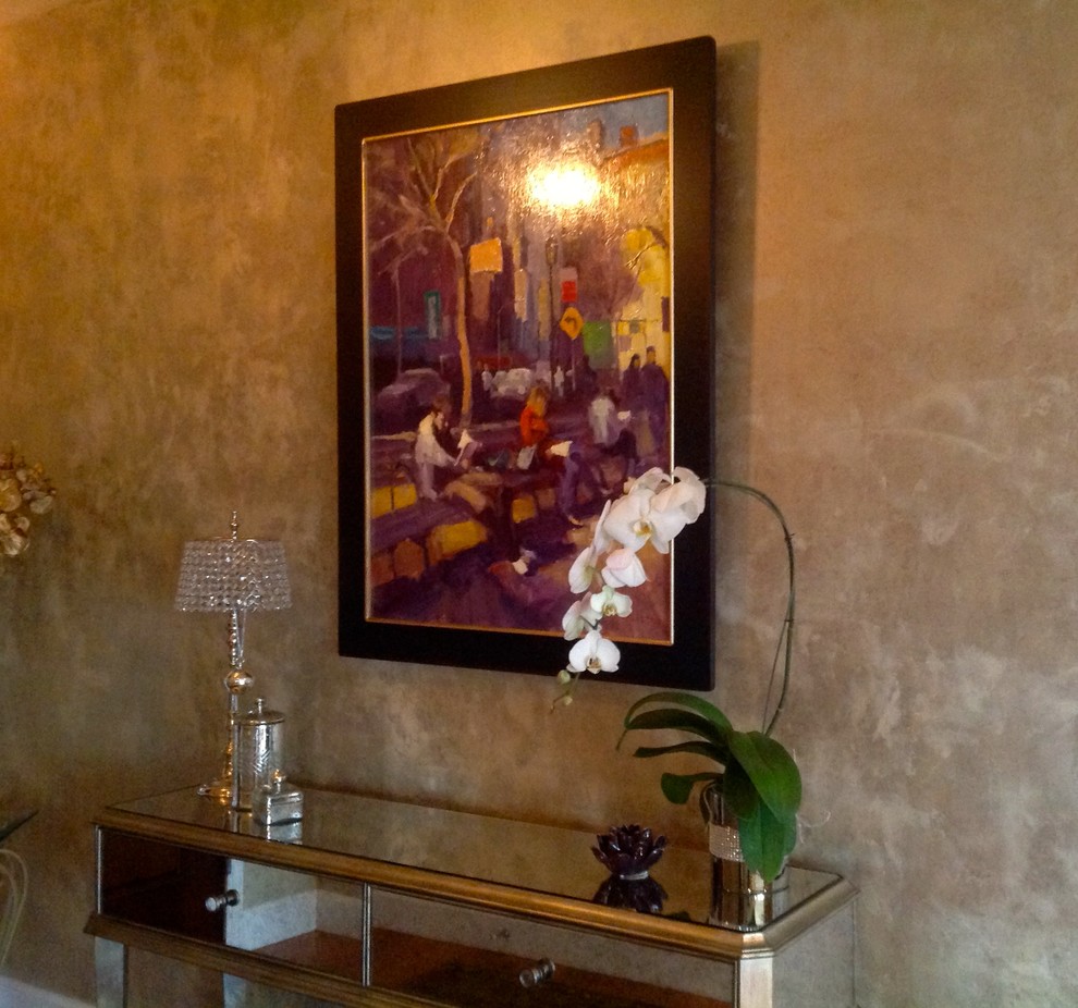 Example of a mid-sized transitional foyer design in Denver with metallic walls