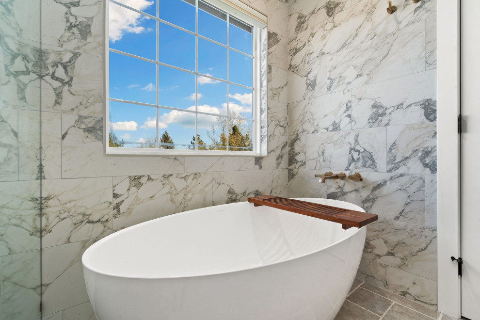 Example of a transitional bathroom design in Denver