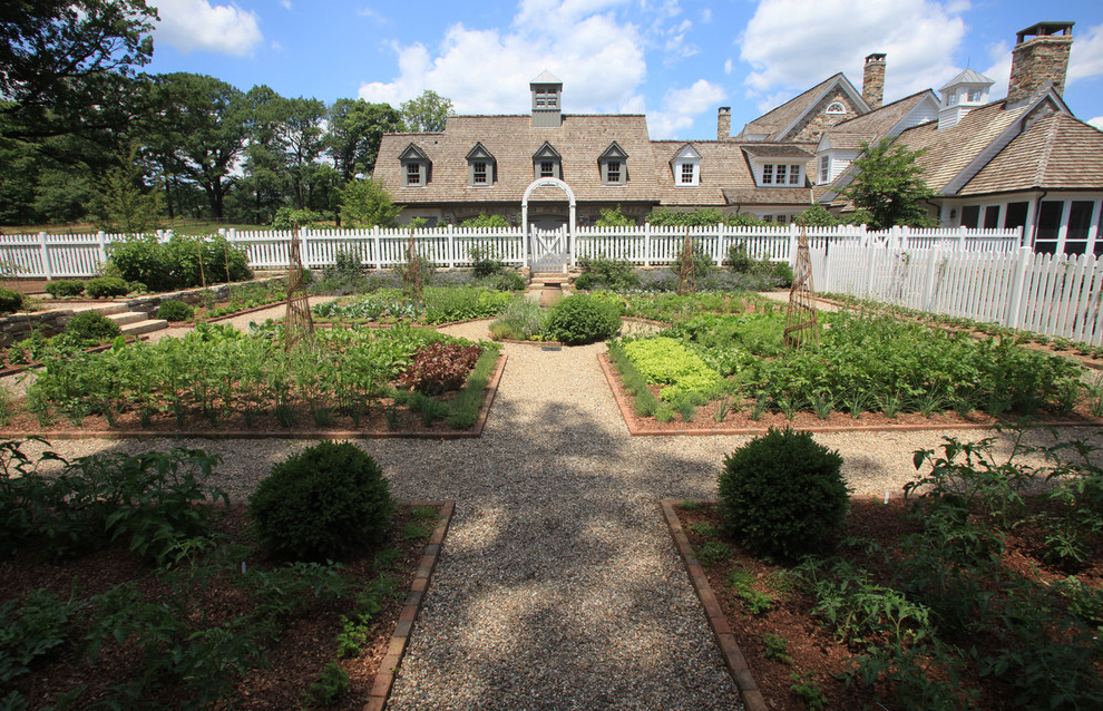 Design ideas for a large traditional garden in New York with a vegetable garden.