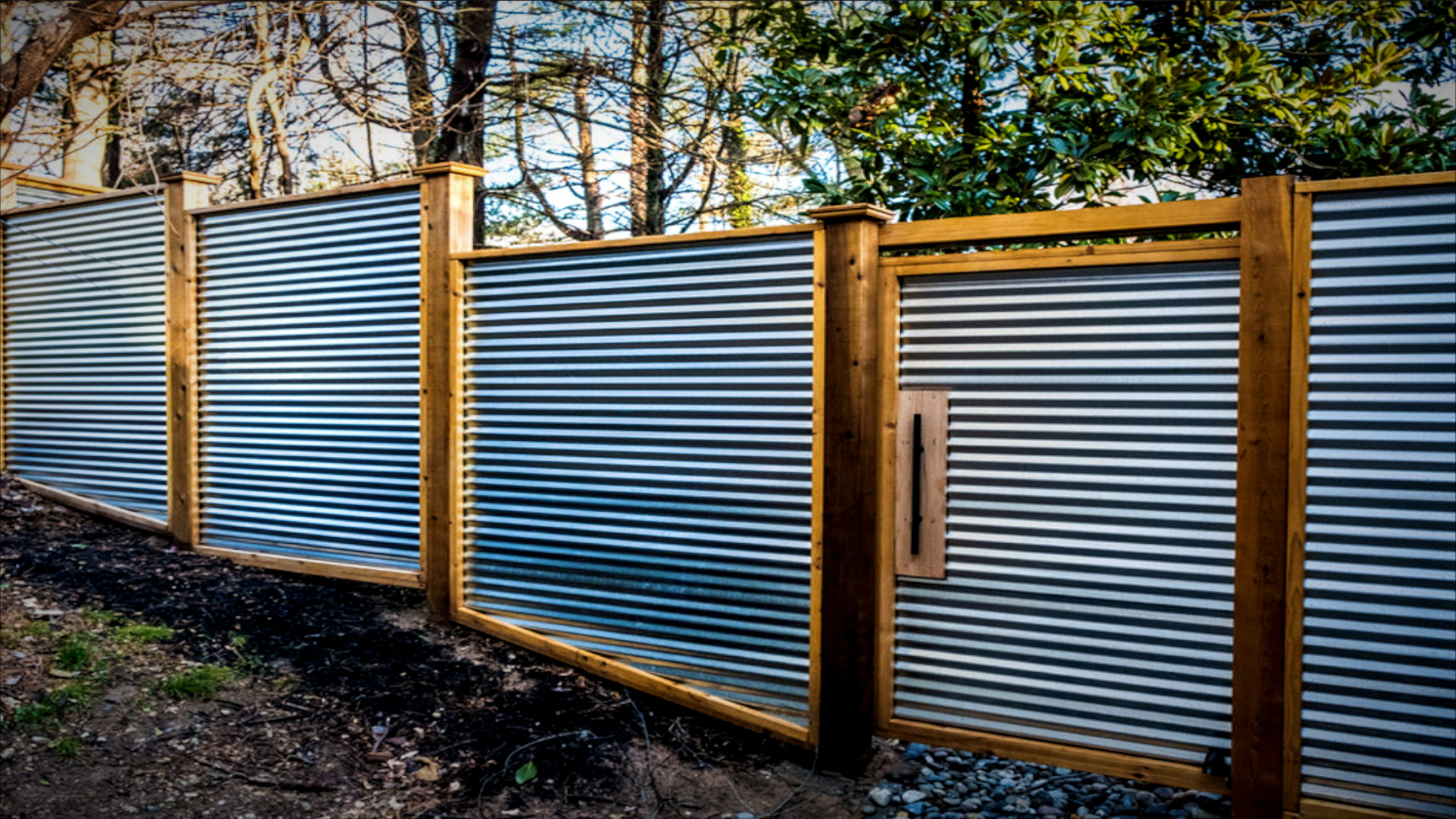 Corrugated metal fence