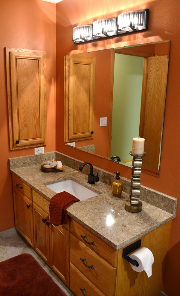 Inspiration for a mid-sized eclectic 3/4 bathroom in Other with medium wood cabinets, a corner shower, beige tile, porcelain tile, orange walls, porcelain floors, an undermount sink and engineered quartz benchtops.