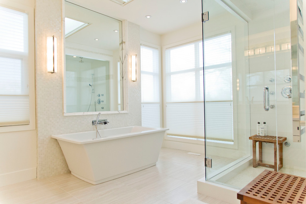 Design ideas for a transitional bathroom in Calgary with a freestanding tub, white tile, mosaic tile and white walls.