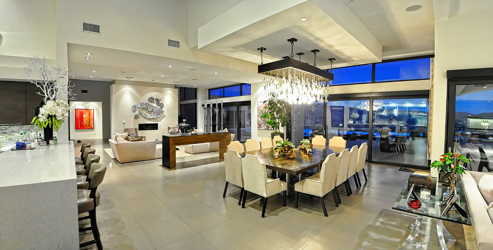 Inspiration for a large modern open plan dining in Orange County with white walls and ceramic floors.