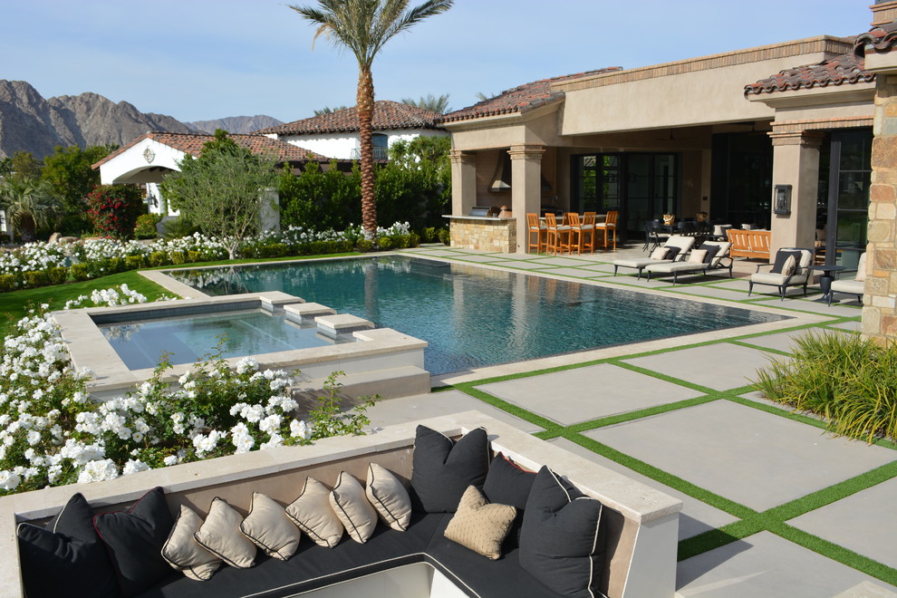 Hot tub - mediterranean backyard rectangular hot tub idea