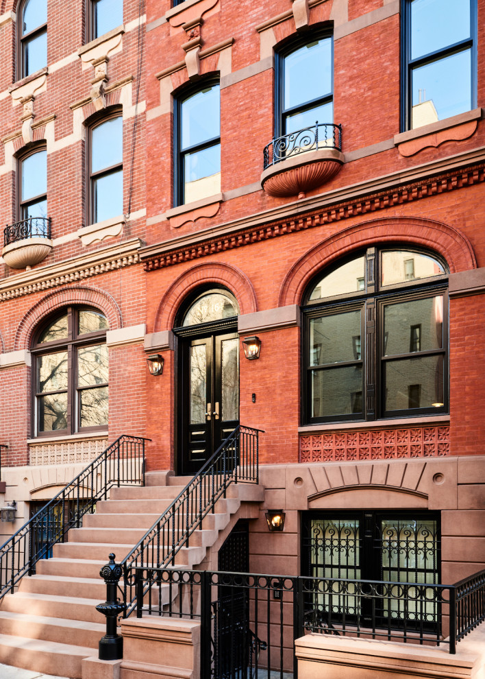 Photo of a small brick exterior in New York with four or more storeys.