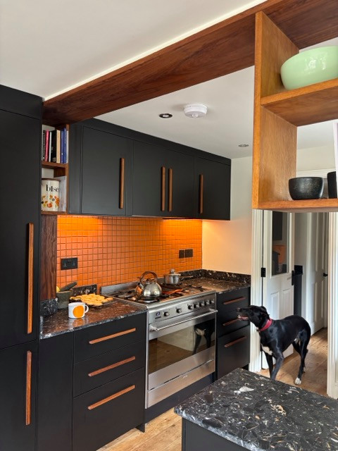 Kitchen Conversion with Bifolding windows and bench seating
