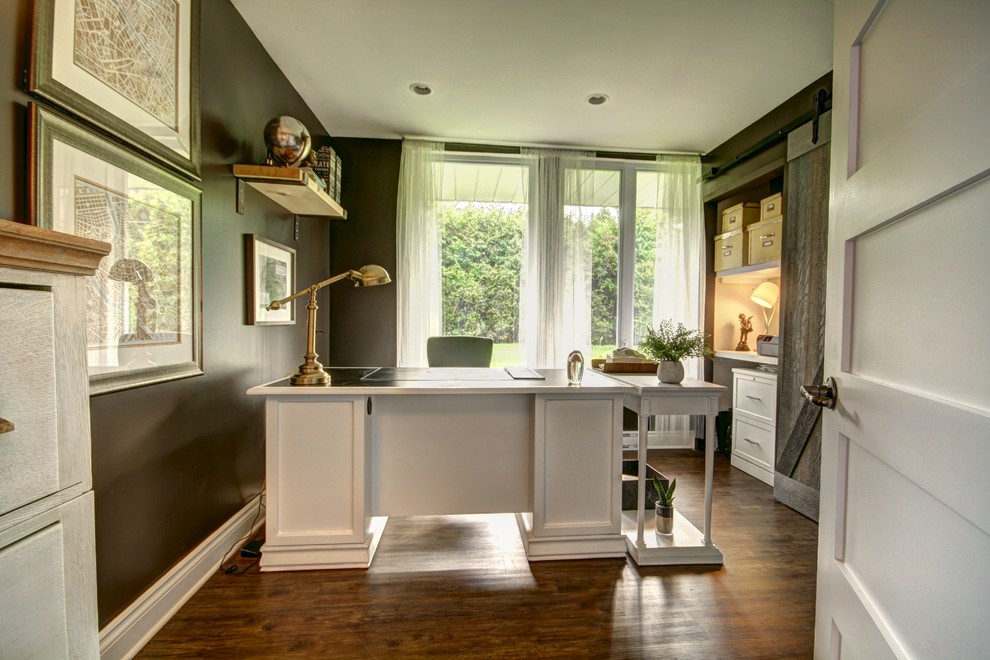 Design ideas for a mid-sized country home office in Montreal with black walls and medium hardwood floors.