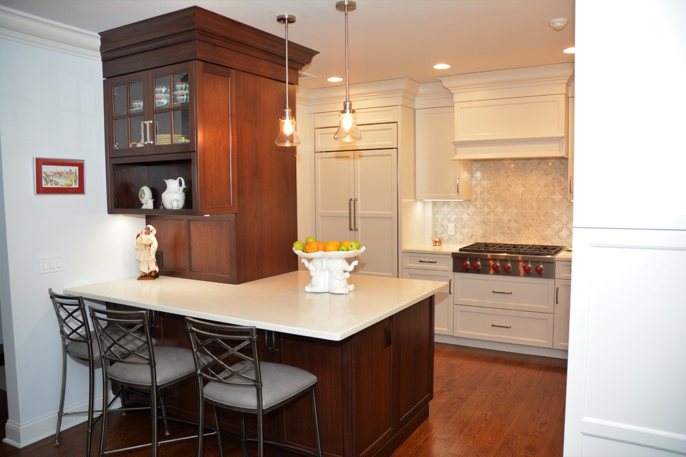 This is an example of a mid-sized transitional kitchen in New York.