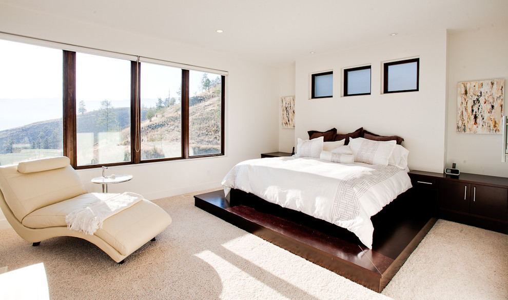 Inspiration for a contemporary bedroom in Vancouver with white walls.