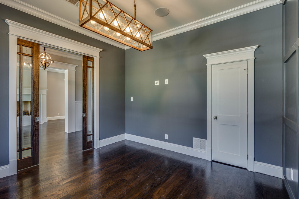 Inspiration for a mid-sized transitional study room in Dallas with grey walls and dark hardwood floors.