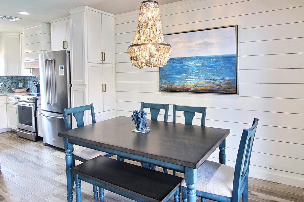 This is an example of a beach style dining room in Austin.