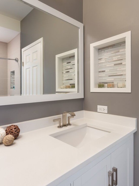 Inspiration for a mid-sized modern master bathroom in Chicago with beaded inset cabinets, white cabinets, an alcove tub, a shower/bathtub combo, a two-piece toilet, gray tile, grey walls, ceramic floors, an undermount sink and marble benchtops.