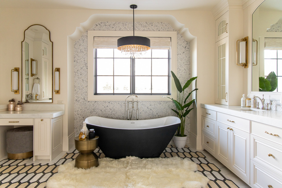 Design ideas for a transitional master bathroom in Salt Lake City with recessed-panel cabinets, white cabinets, a freestanding tub, gray tile, mosaic tile, white walls, an undermount sink, multi-coloured floor, white benchtops, a single vanity and a built-in vanity.