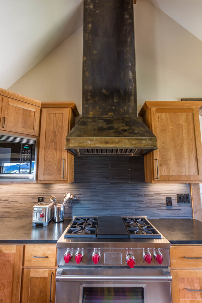 Kitchen - rustic kitchen idea in Denver with shaker cabinets, light wood cabinets, granite countertops and stainless steel appliances