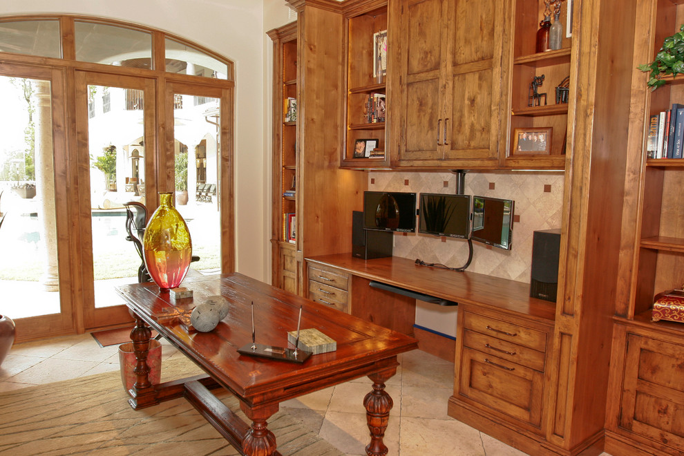 Tuscan home design photo in Houston