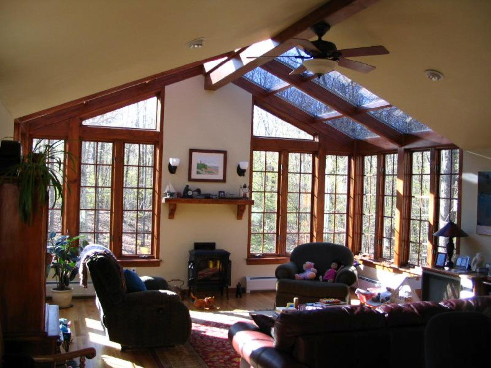 Photo of a traditional sunroom in New York.