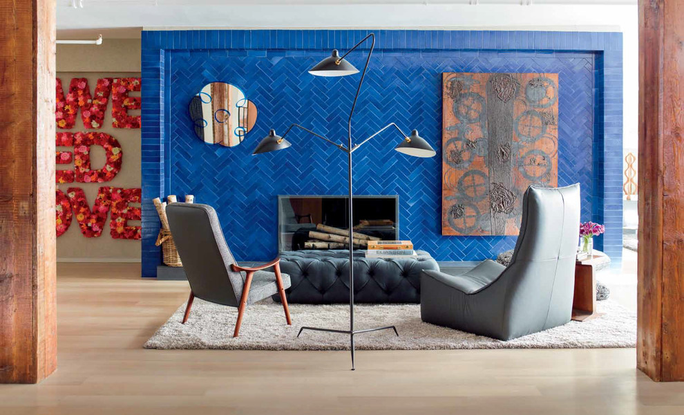 Trendy light wood floor living room photo in San Francisco with a standard fireplace and a brick fireplace