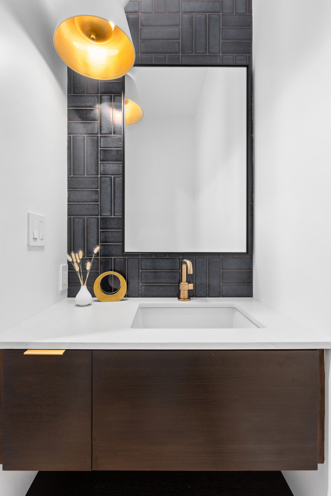 Design ideas for a contemporary powder room in San Diego.