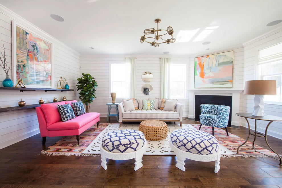 Inspiration for a transitional dark wood floor and brown floor living room remodel in Charleston with white walls and a standard fireplace
