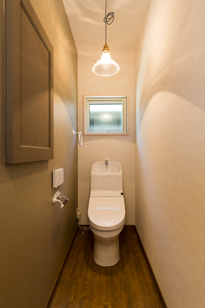 Transitional powder room in Other with green walls, dark hardwood floors and brown floor.