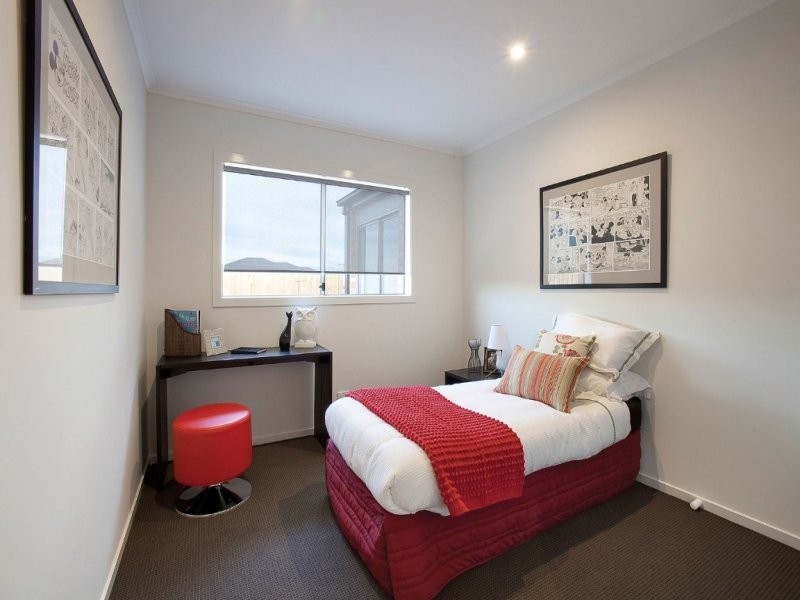Inspiration for a mid-sized contemporary bedroom in Melbourne with white walls and carpet.