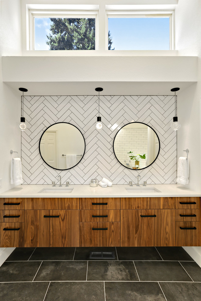 Transitional master bathroom in Seattle with flat-panel cabinets, medium wood cabinets, white tile, ceramic tile, porcelain floors, engineered quartz benchtops, white benchtops and black floor.