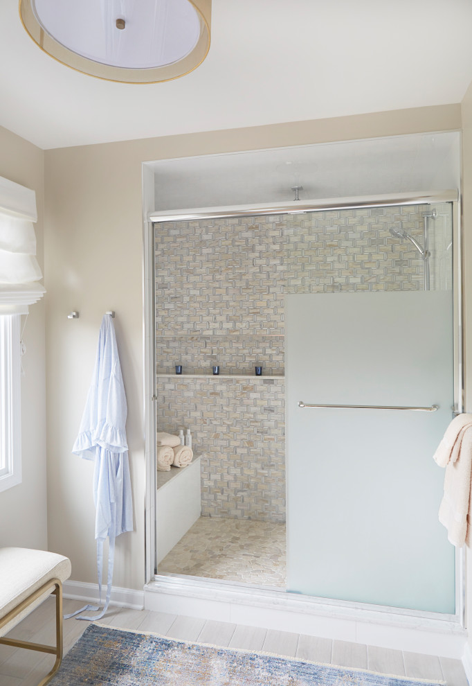 Alcove shower - large transitional master white tile and subway tile porcelain tile, beige floor and double-sink alcove shower idea in Chicago with recessed-panel cabinets, light wood cabinets, a one-piece toilet, beige walls, an undermount sink, quartzite countertops, a hinged shower door, white countertops, a niche and a built-in vanity