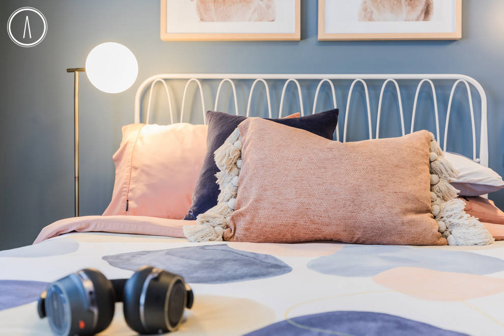This is an example of a midcentury bedroom in Perth.